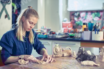 Artist creates clay sculptures while focused on intricate details in a bright studio filled with art 2 E117ZZGU.jpg?w=350&h=350&cf fit=scale down&mark=https%3A%2F%2Fassets.market storefront.envato static.com%2Fwatermarks%2Fphoto 260724
