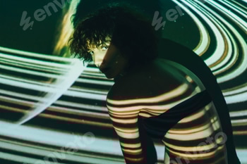 Woman on background of projection of lines. 2 E10FWAN.jpg?w=350&h=350&cf fit=scale down&mark=https%3A%2F%2Fassets.market storefront.envato static.com%2Fwatermarks%2Fphoto 260724