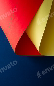 Vibrant red and yellow paper shapes contrasted against a blue background. 2 E113ADJU.jpg?w=350&h=350&cf fit=scale down&mark=https%3A%2F%2Fassets.market storefront.envato static.com%2Fwatermarks%2Fphoto 260724