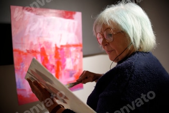 Older woman artist painting an abstract artwork 2 E118KQUU.jpg?w=350&h=350&cf fit=scale down&mark=https%3A%2F%2Fassets.market storefront.envato static.com%2Fwatermarks%2Fphoto 260724
